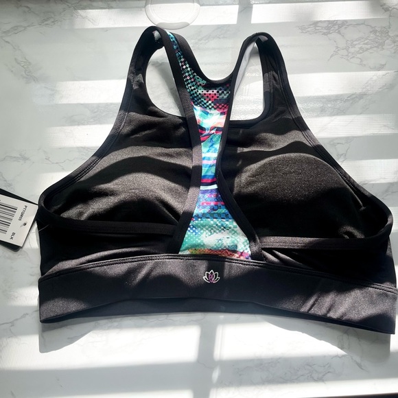 Other - New with tags padded Sports Bra Size Medium​